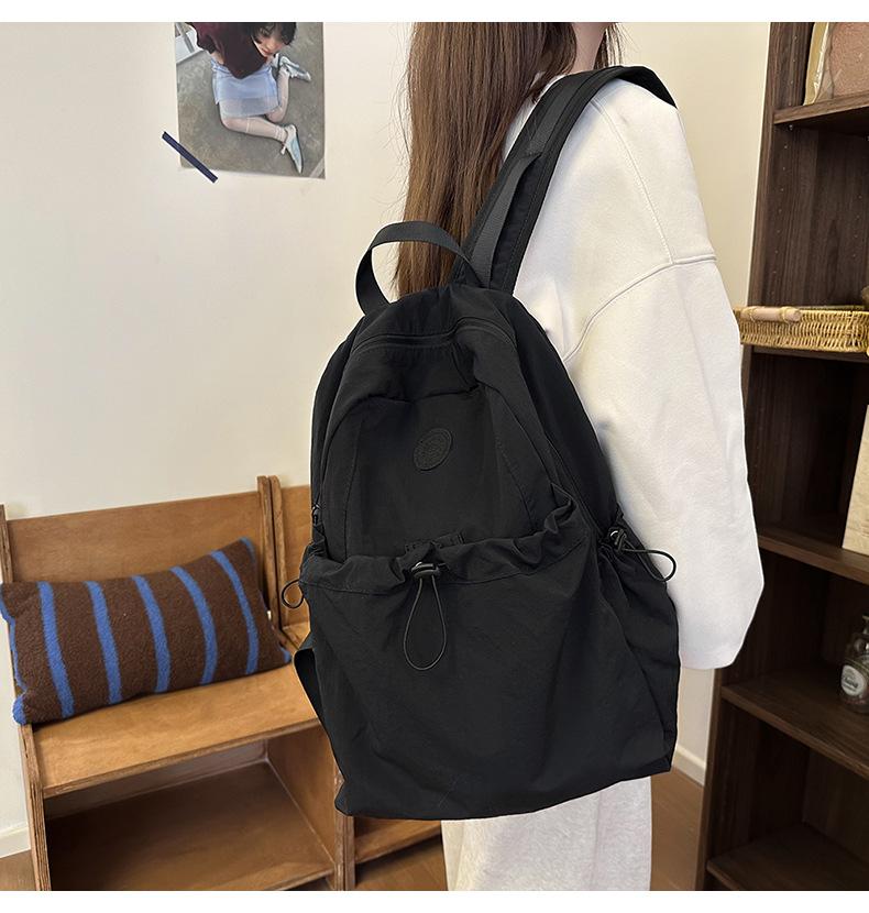 Product Introduction of Backpack, Student Schoolbag, Outdoor Backpack Leisure Simple and Lightweight Early High School Student Schoolbag New Drawstring All-Match Travel Backpack 5