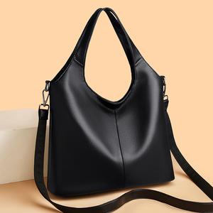 A solid color women's shoulder bag handbag with a long crossbody strap, zipper closure, multiple pockets, soft texture, a high-end tote bag that makes an excellent gift