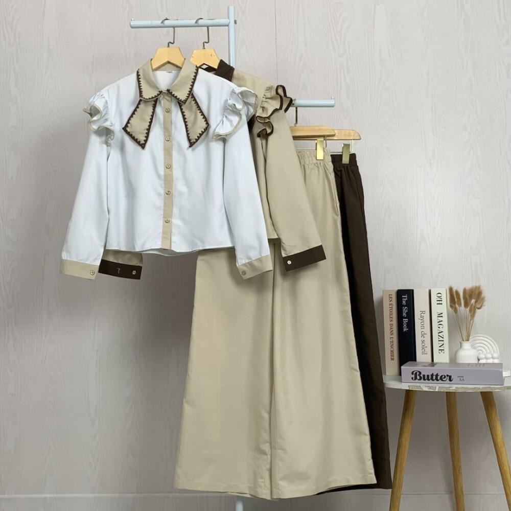 Asaya Setelan dua potong atasan dan celana longgar dengan kombinasi warna yang stylish dan terbaru.