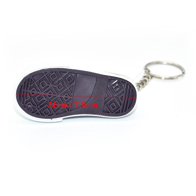 Product Introduction of Motorcycle Bicycle Foot Support Mini Cute Shoes Creative Car Keychains for Motorbike Bike Tripod Canvas Shoes Decor Cover 2