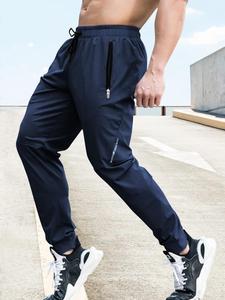 Pantalones jogger para hombre con estampado de letras, bolsillo con cierre de cremallera, corte regular, casuales, suaves, cómodos y transpirables, con cintura con cordón para uso diario, pantalones para hombre para primavera y otoño