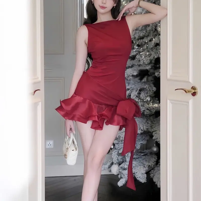 Đầm umi sát nách dáng ngắn đính nơ lệch 2