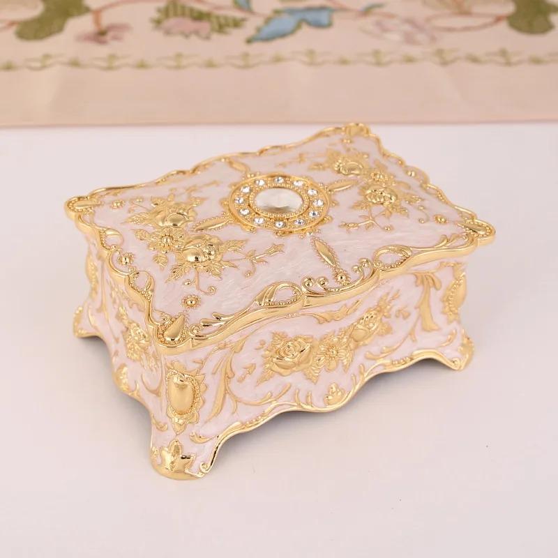 Product Introduction of European retro jewelry box metal enamel color creative ring necklace earrings storage box knot marriage gift 12