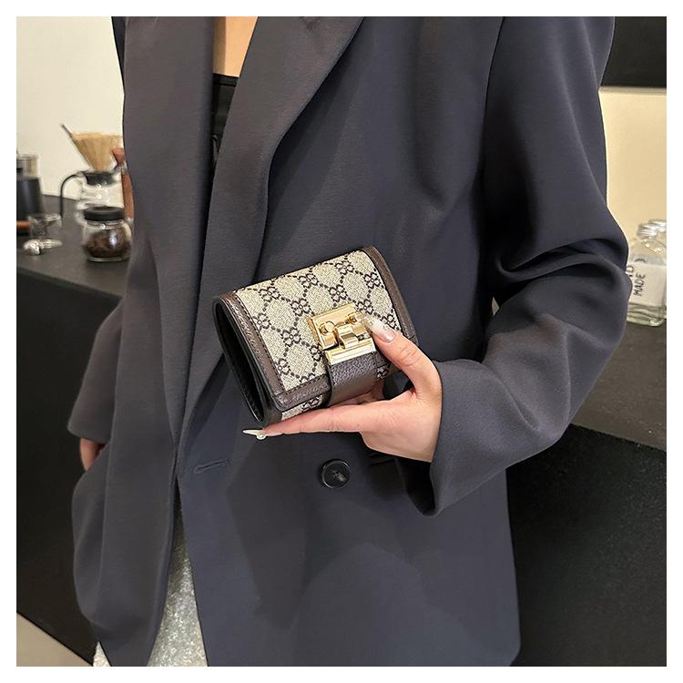 Product Introduction of Ladies' Short, High Appearance, Multi Slot, Three Fold Buckle, Hand-held Long Wallet 25
