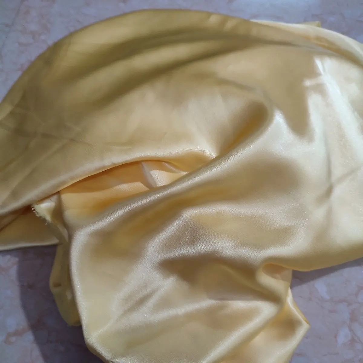 Vải quần lụa bóng phước thịnh vàng mỡ gà