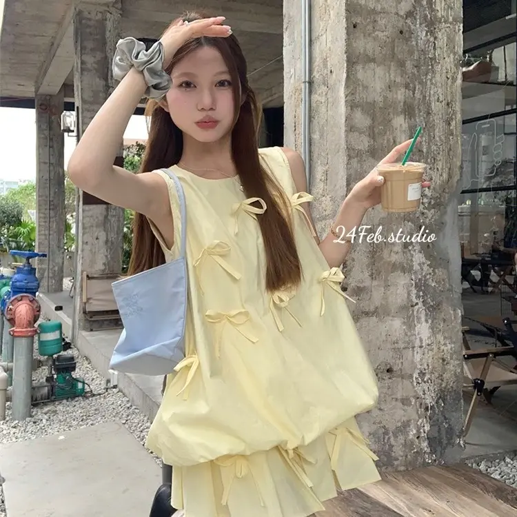 [SET55] Set áo ba lỗ kèm chân váy xếp li dáng ngắn đính nơ phong cách tiểu thư Hàn Quốc 5
