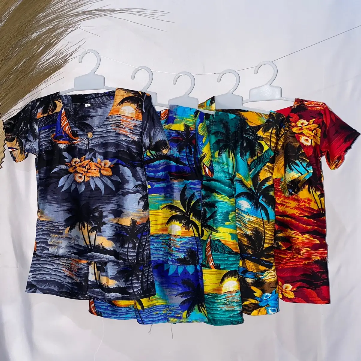 SETELAN ANAK KANCING MOTIF PANTAI BARU