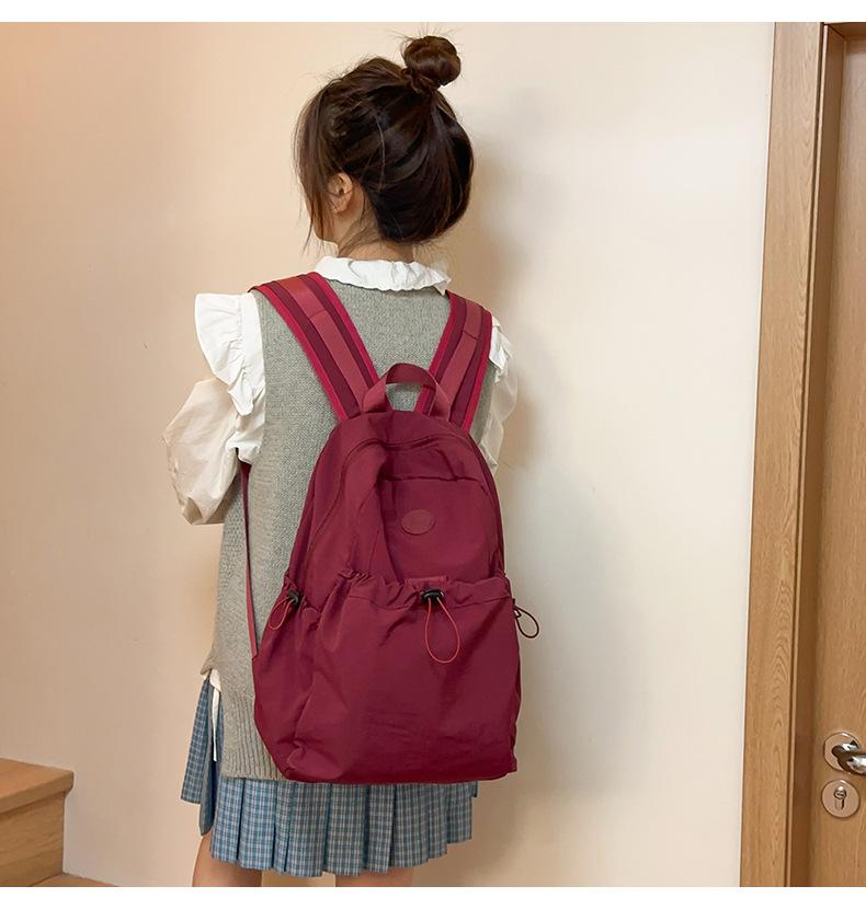 Product Introduction of Backpack, Student Schoolbag, Outdoor Backpack Leisure Simple and Lightweight Early High School Student Schoolbag New Drawstring All-Match Travel Backpack 9