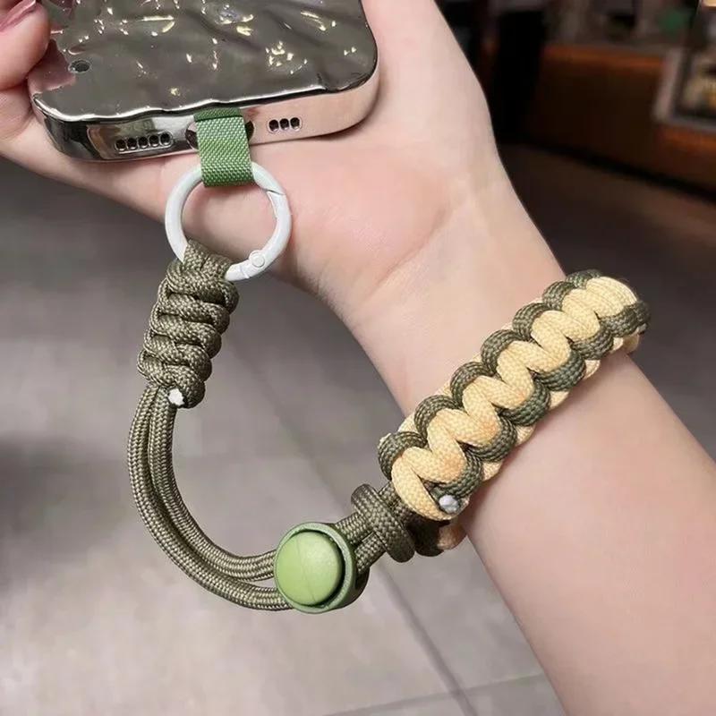 Product Introduction of Suitable for all mobile phone series,iPhone， outdoor anti loss hanging card bracelet, hand woven jewelry, adjustable length, multi-functional universal mobile phone wristband holder 1