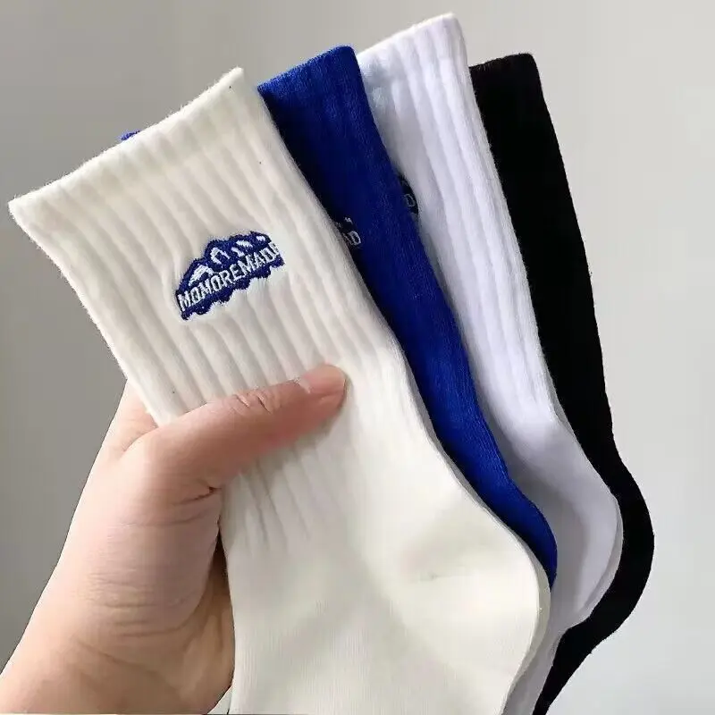Breathable sweat-absorbent polyester-cotton thick sports couple socks mid-tube sports snow mountain socks