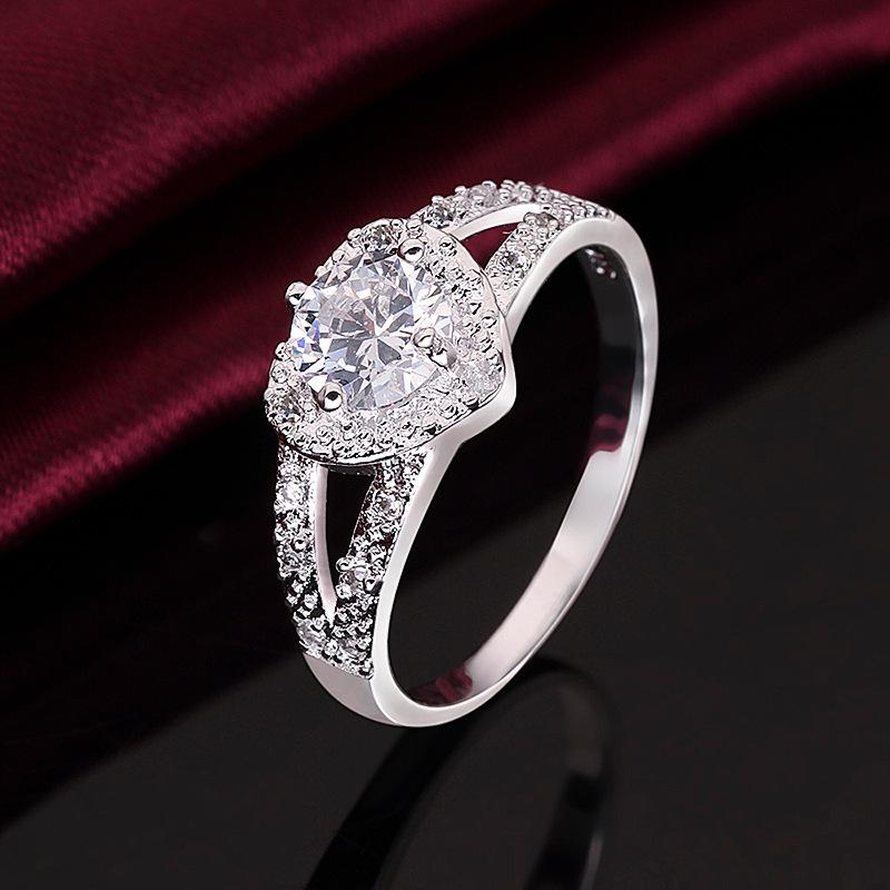 Product Introduction of Fashion Heart-Shaped Ring Hot Sale Ring Silver Plated Women's Ring European and American Zircon Gift All-Match Earrings 0