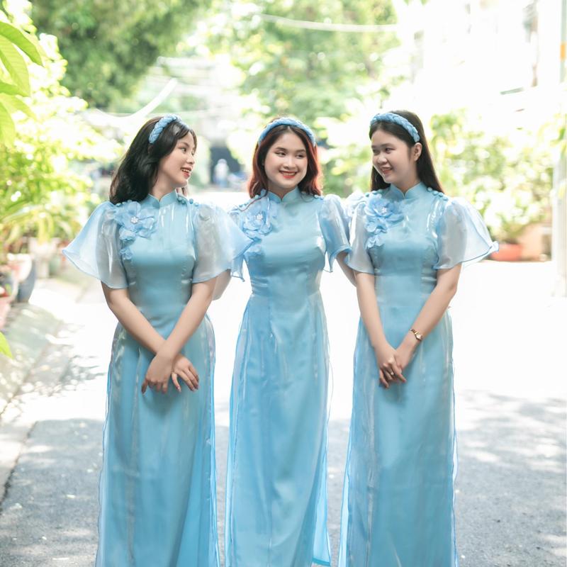 Áo dài bigsize 4 tà vải tơ, lụa và có gắn hoa trước ngực (Bao gồm quần và áo) áo dài tết  cho 2k13 đen đính nơ cúc 3