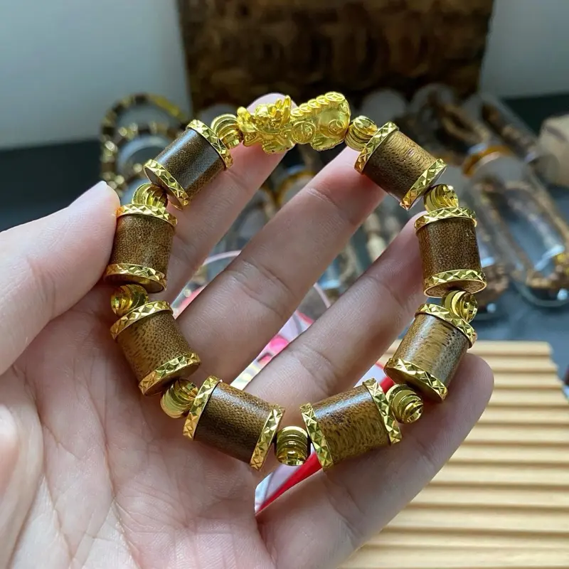 Vòng trầm hương đốt trúc bọc khoen vàng mix tỳ hưu