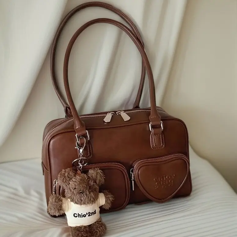 Nanfeng Chio2nd pictorial girl pillow bag is popular this year, and women's handheld shoulder armpit bag