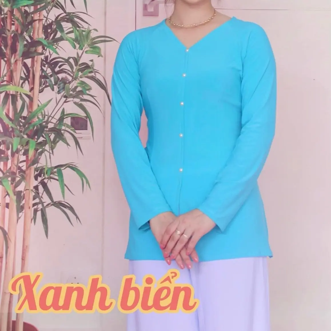 Áo bà ba màu xanh biển thun solen 40 đen 80kg