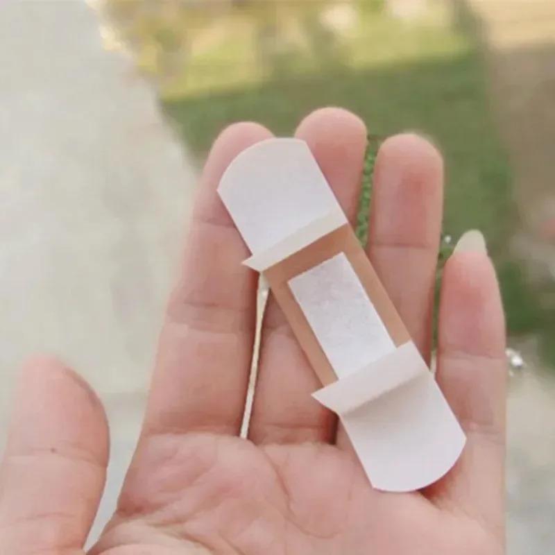 100pcs/lot Breathable Band Aid Waterproof Bandage First Aid Wound Dressing Medical Tape Wound Plaster Emergency Kits Bandaids 1