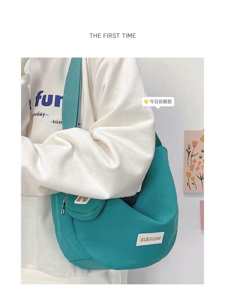 Product Introduction of กระเป๋าสะพายข้าง สไตล์ญี่ปุ่น อเนกประสงค์ เหมาะสำหรับฤดูใบไม้ร่วงและฤดูหนาว ความจุมาก ทำจากผ้าแคนวาส เหมาะสำหรับนักศึกษาหญิง ไหล่เดียว เหมาะสำหรับการเดินทาง กระเป๋าดัมเบง 20