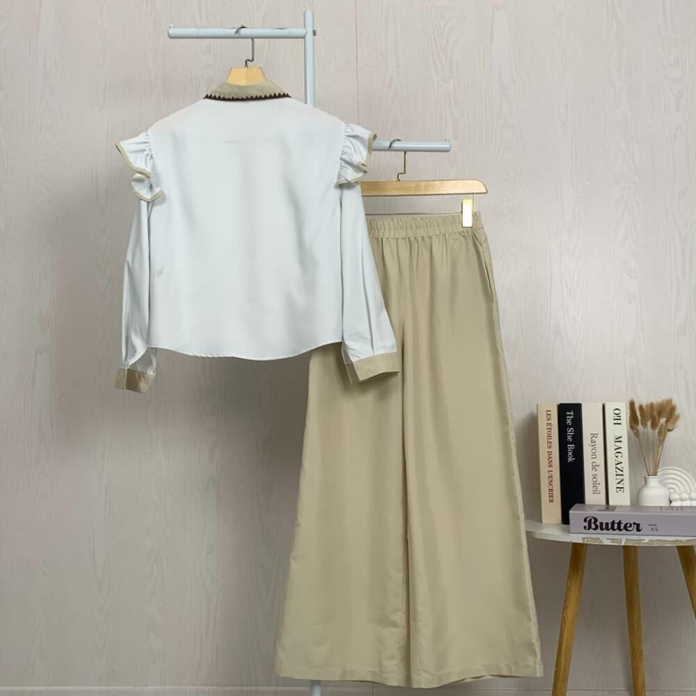 Asaya Setelan dua potong atasan dan celana longgar dengan kombinasi warna yang stylish dan terbaru.