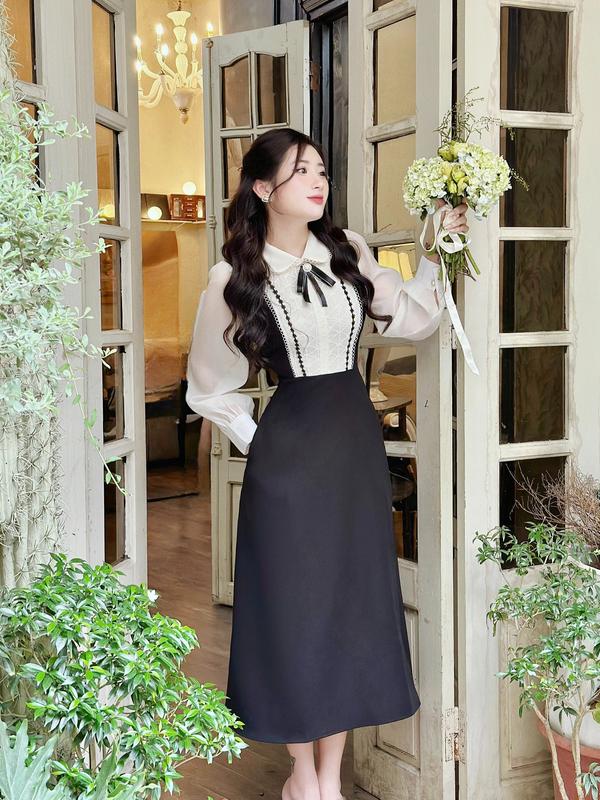 váy nơ cổ họa tiết đối xứng dài tay, đầm liền có khóa sau và nơ cài cho chị em đi du lịch, đi tiệc, đi hẹn hò đều xinh