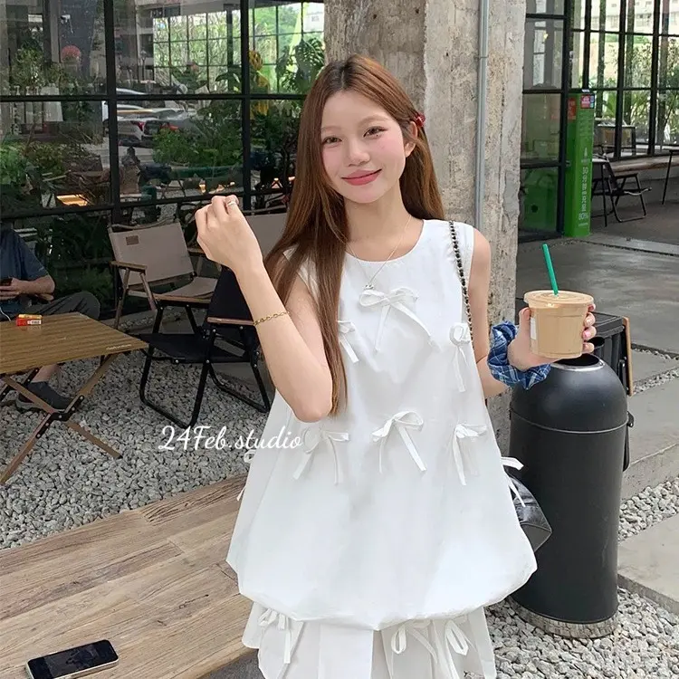 [SET55] Set áo ba lỗ kèm chân váy xếp li dáng ngắn đính nơ phong cách tiểu thư Hàn Quốc 1