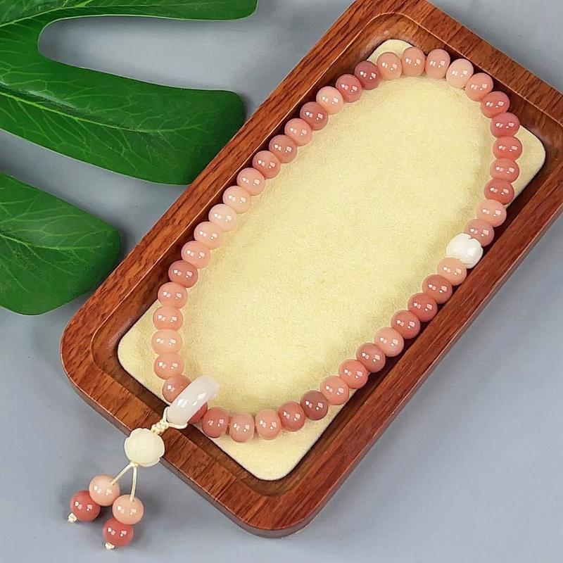 Product Introduction of Pink white jade bodhi root bracelet Female circular finger soft play bodhi Buddha beads student disk play gradient bracelet 15