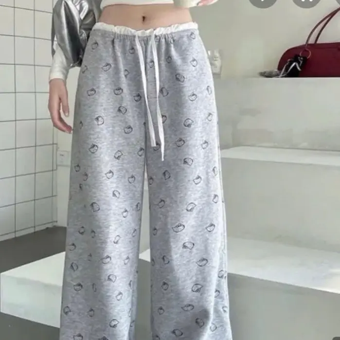 Quần ống suông Nữ họa tiết Nơ,Hello kitty chất vải Da Cá Tàu co giãn đẹp. 4