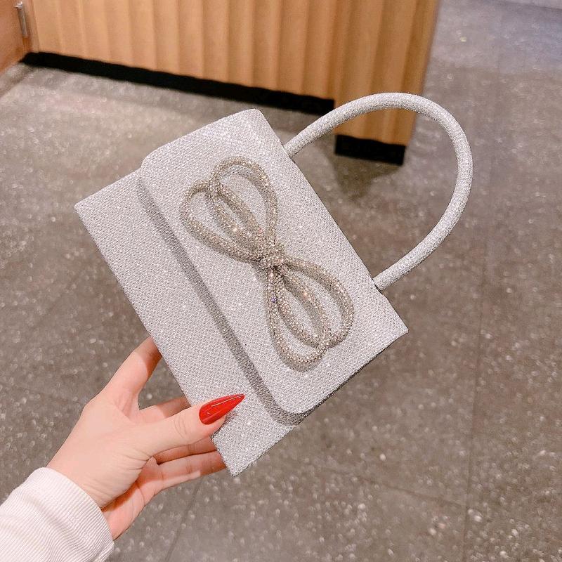  Túi Xách Nữ Đeo Chéo Size 20cm Women Bag Clutch Cầm Tay Cốp Đi Tiệc Chất Nhũ Kim Tuyến Nơ Đôi Kèm Dây Xích Hàng QC Nhung Kem tuixinh giare 