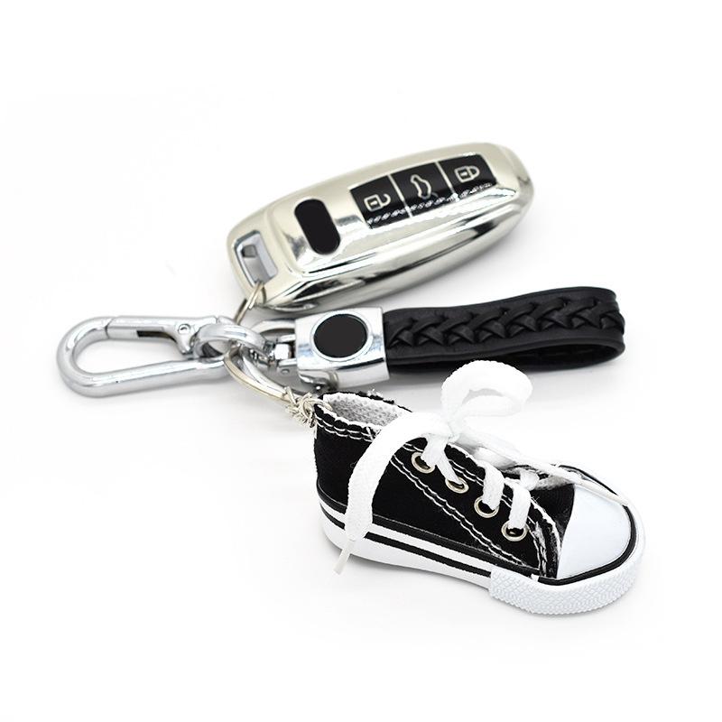 Product Introduction of Motorcycle Bicycle Foot Support Mini Cute Shoes Creative Car Keychains for Motorbike Bike Tripod Canvas Shoes Decor Cover 5