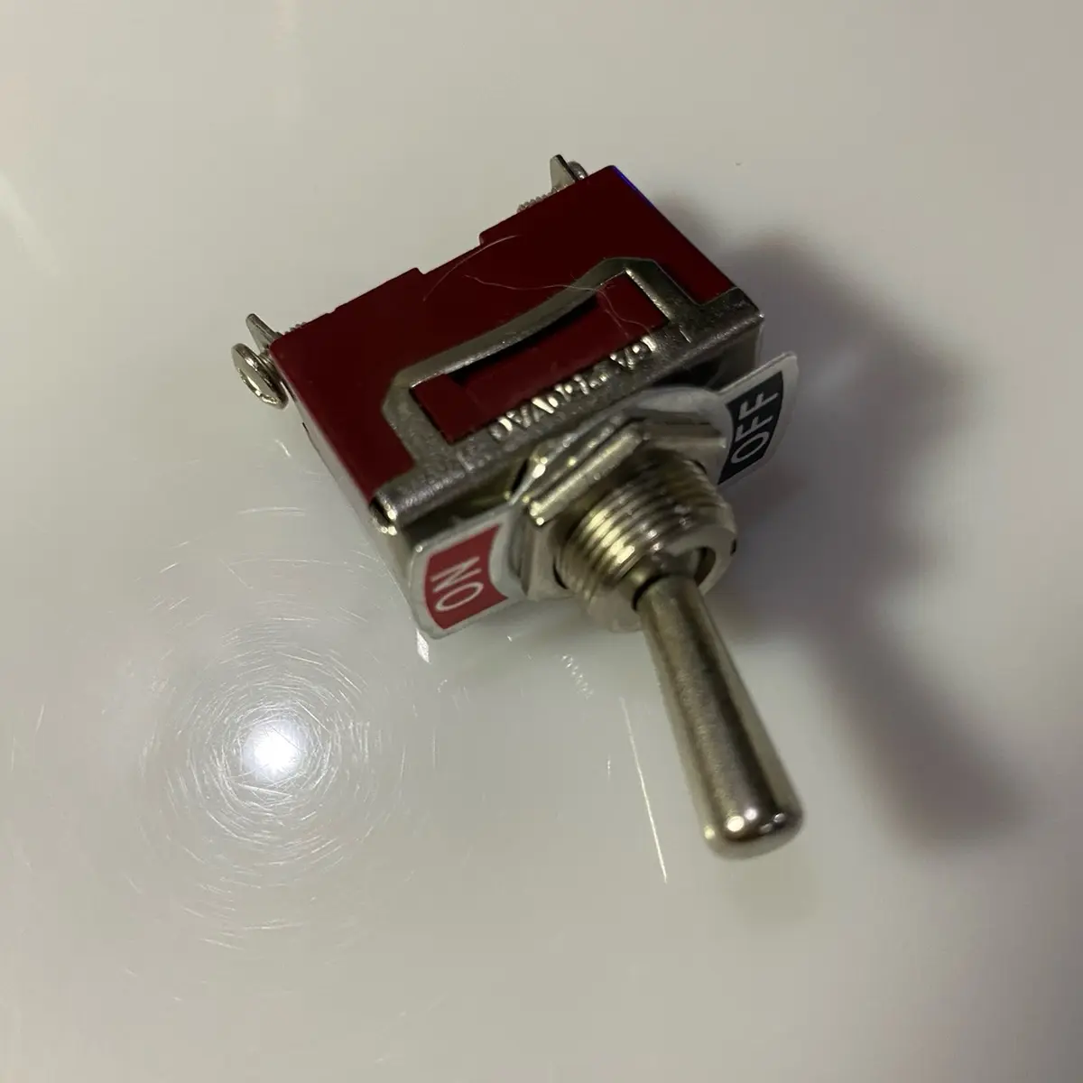 CÔNG TẮC GẠT INOX NÂU LỚN 2 CHÂN