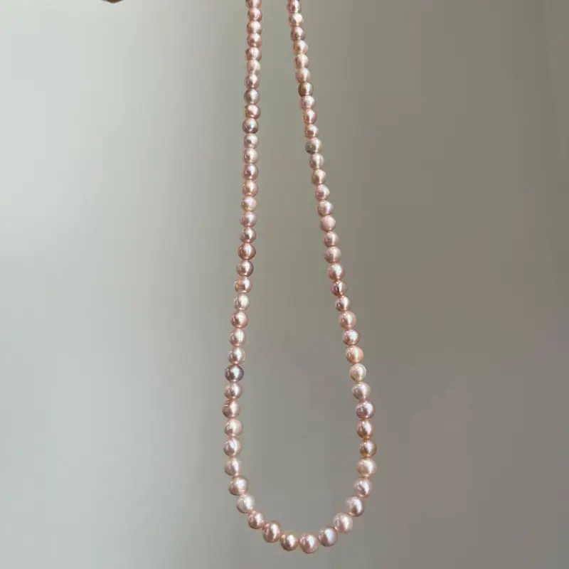 Dây chuyền 5-6mm ánh hồng dáng tròn oval 1