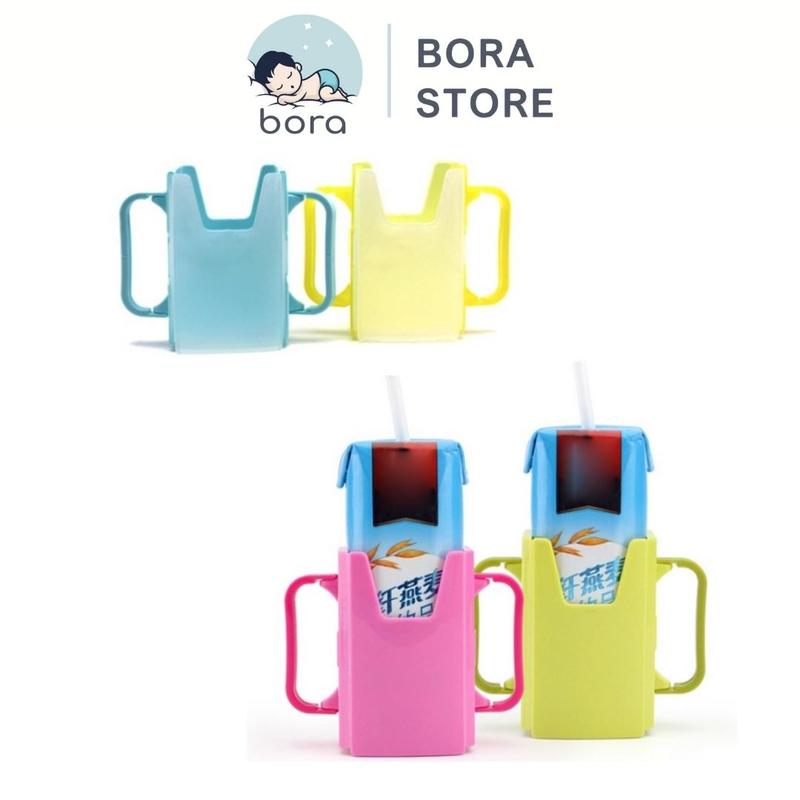 Hộp đựng sữa hộp có quai cầm, giúp bé tự uống sữa hộp dễ dàng