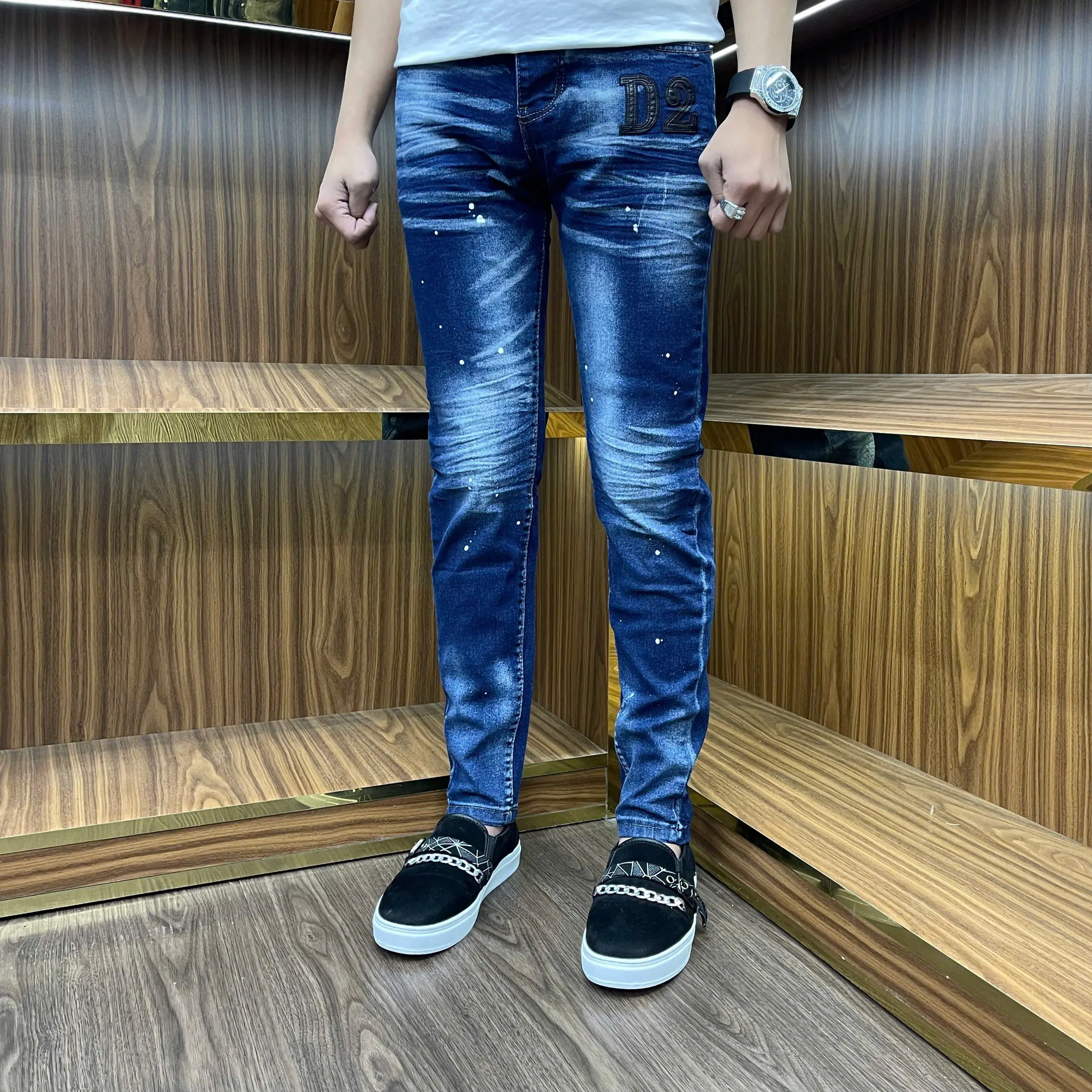 Quần Jeans nam xanh thêu da đen đùi dập nhăn bốn cúc