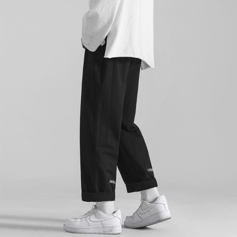 Quần dài Kaki ống rộng Unisex xuông lưng chun trẻ trung + tặng kèm móc khóa Menswear Ong Kem Cotton Đen Nhung