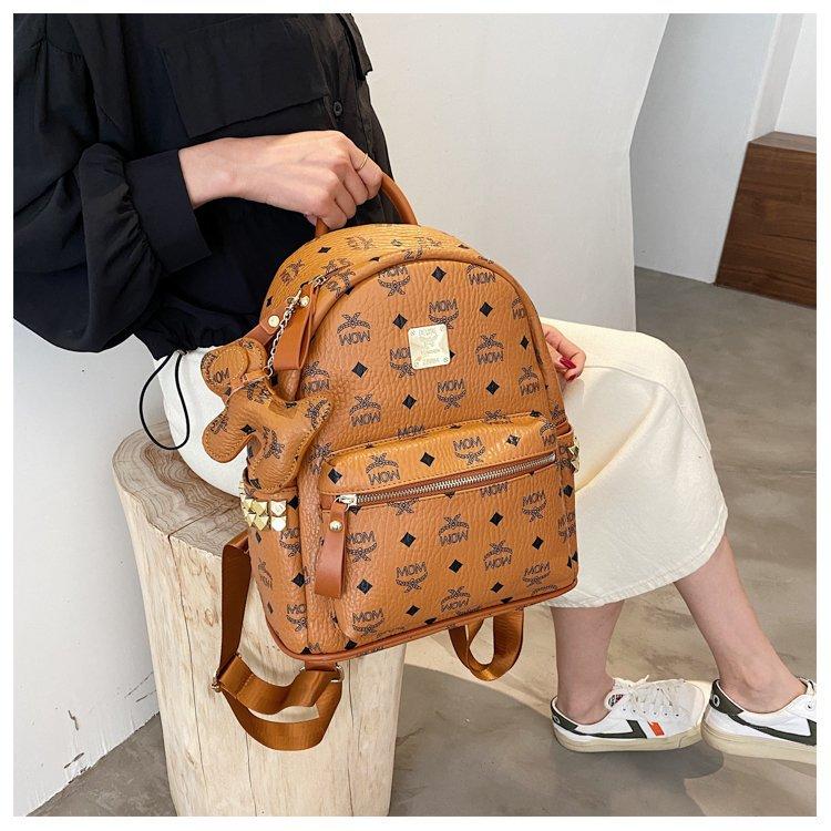 Product Introduction of 2024 factory wholesale Women's backpack Korean-style fashion Pu retro classic presopbackpack letter rivet women's backpack 9