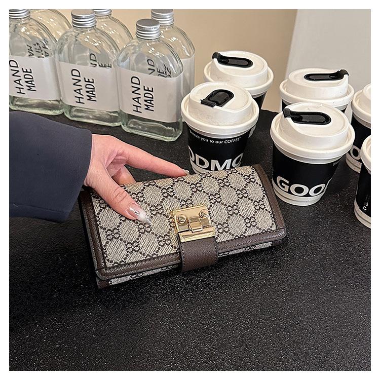 Product Introduction of Ladies' Short, High Appearance, Multi Slot, Three Fold Buckle, Hand-held Long Wallet 26