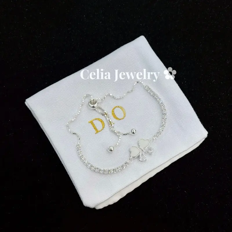 Lắc tay bạc nữ nơ đính đá lắc tay rút bản cao cấp + Tặng nước rửa bạc - Ảnh Celia chụp