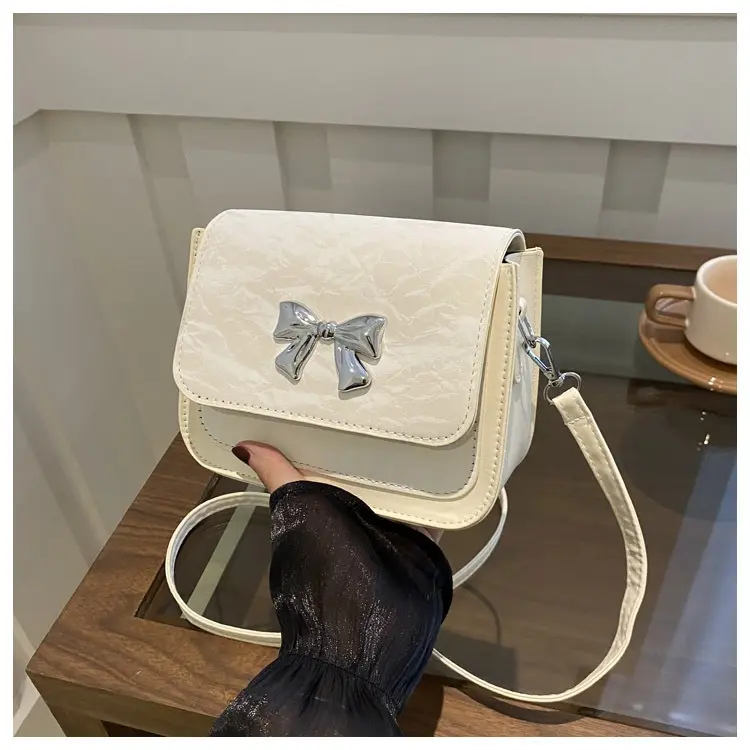 Túi đeo chéo nữ mác nơ dễ thương đi chơi tết da nhung mềm dự tiệc đẹp Hiếu Túi Store 616 Bag