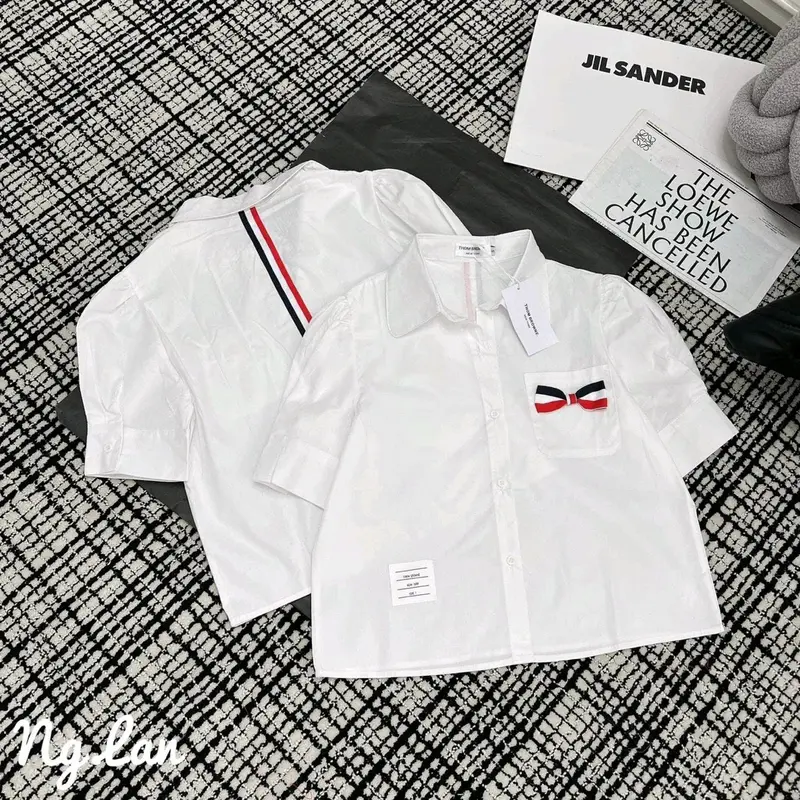 Áo sơ mi nữ màu trắng nơ kẻ 0