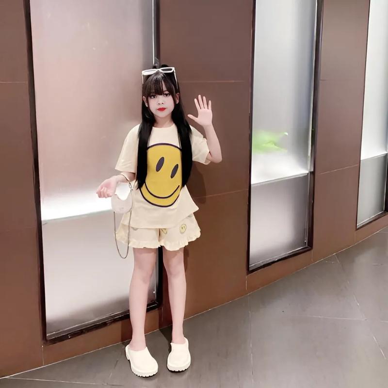 4-14 TUỔI Bộ quần áo bé gái áo cộc tay in hình mặt cười dễ thương chất vải cotton mềm mịn.M19 4
