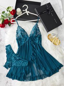 女性セクシーなフリルのトリムのCamiのNightdress及び弓の装飾のパンティセット、快適で遊び心のある花のレースはSleepwearセットを通して見ます