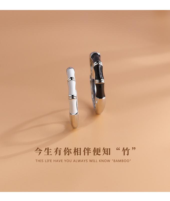 Product Introduction of A pair of black and white drip rings with an open finger ring for men and women 1