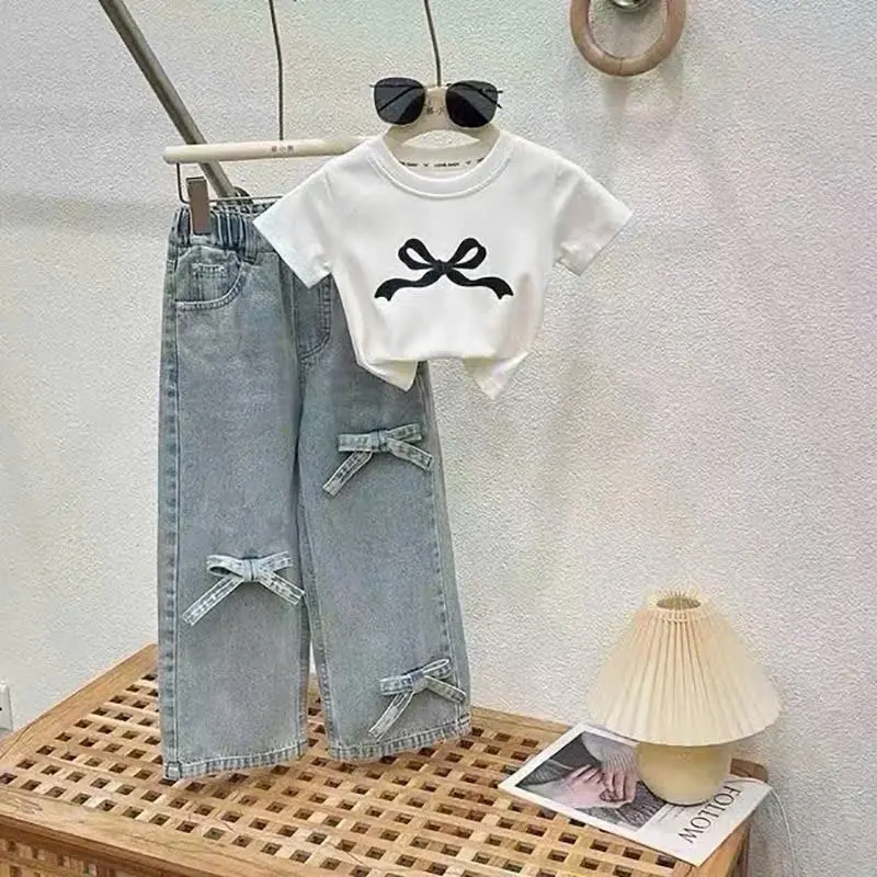 Sét quần bò đính nơ cho bé 4