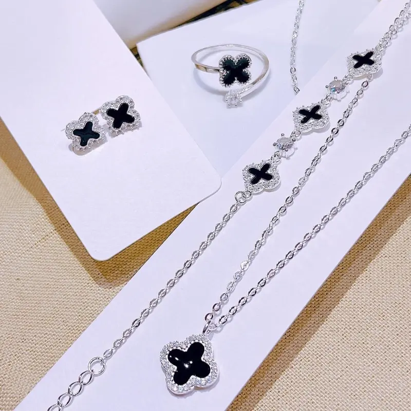 Set Bộ Trang Sức Cỏ 4 Lá Sơn Màu Đen Viền Đá Có Lẻ Món ( Dây - Bông - nhẫn hở - lắc tay ) Cho  Phụ nữ HTJ 0