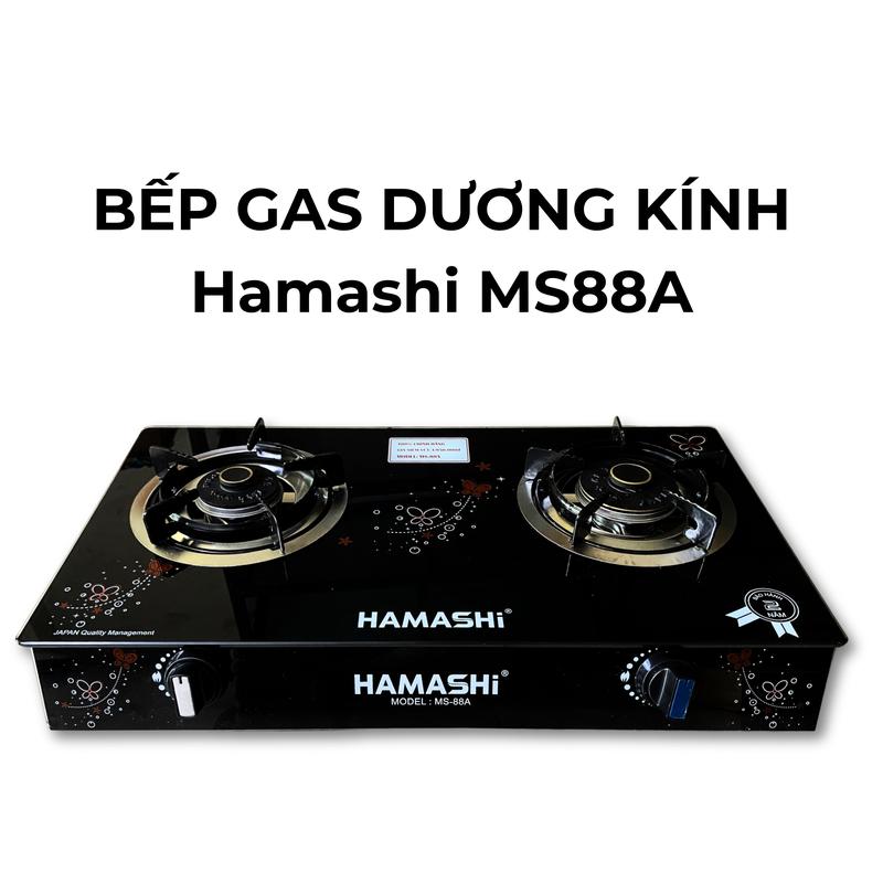 Bếp gas đôi mặt kính HAMASHI -MS-88A Inox Khay Knox mặt kính dày 8mm khay inox Dễ làm sạch kiềng tráng men có chắn gió. Mâm chia lửa bằng đồng