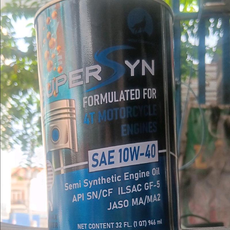NHỚT SUPER SYN 10w-40 màu sanh danh co xe so ...xe con tây. 1
