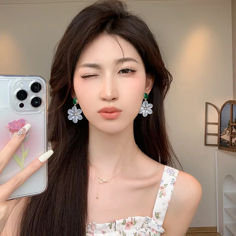Korean fashion trend: Oversized flower earrings for stylish girls