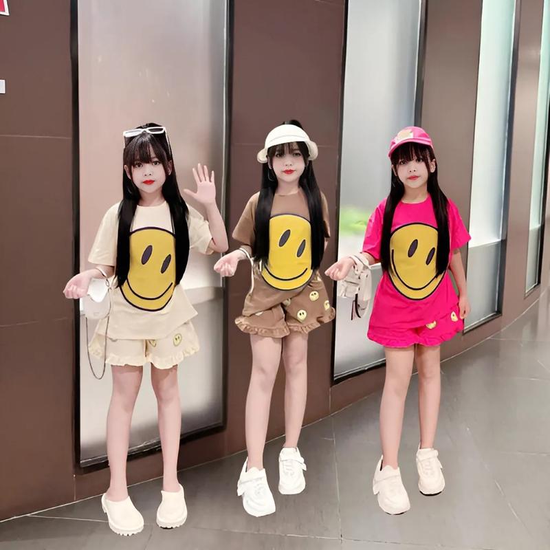 4-14 TUỔI Bộ quần áo bé gái áo cộc tay in hình mặt cười dễ thương chất vải cotton mềm mịn.M19 0