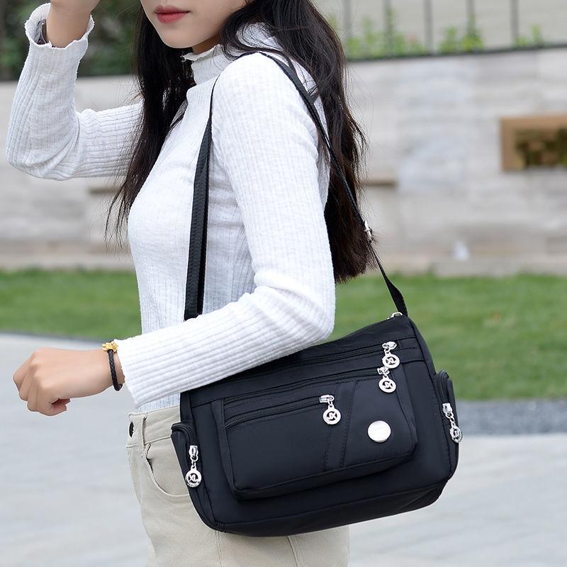 Product Introduction of Women's Bag Mother's Bag New 2025 Middle-Aged Women's Bag Nylon Canvas Bag Waterproof Multi-Layer Shoulder Messenger Bag 10