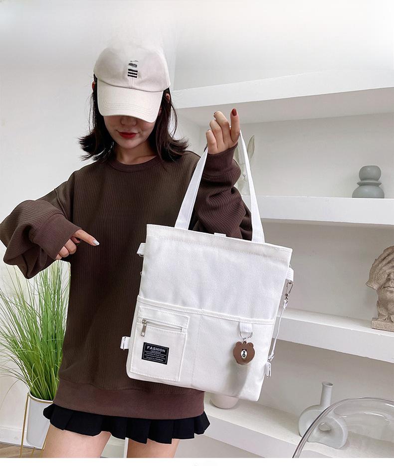 Product Introduction of Túi Đeo Vai, Phong Cách Hàn Quốc, Chất Liệu Vải Bố, Thích Hợp Cho Học Sinh Nữ, Phong Cách Dễ Thương Và Dễ Phối Đồ Thích Hợp Cho Khuôn Viên Học Sinh, Thích Hợp Cho Bạn Gái, Túi Cùng Mẫu, Túi Xách Bag Tote Chữ Nhật Hình Chữ Nhật 26