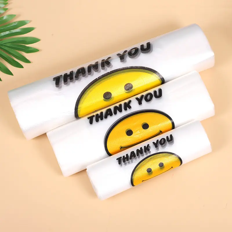 100pcs/pack  Carry Out Bags Smile Gift Bag Retail Supermarket Grocery Shopping Plastic Bags with Handle Food Packaging